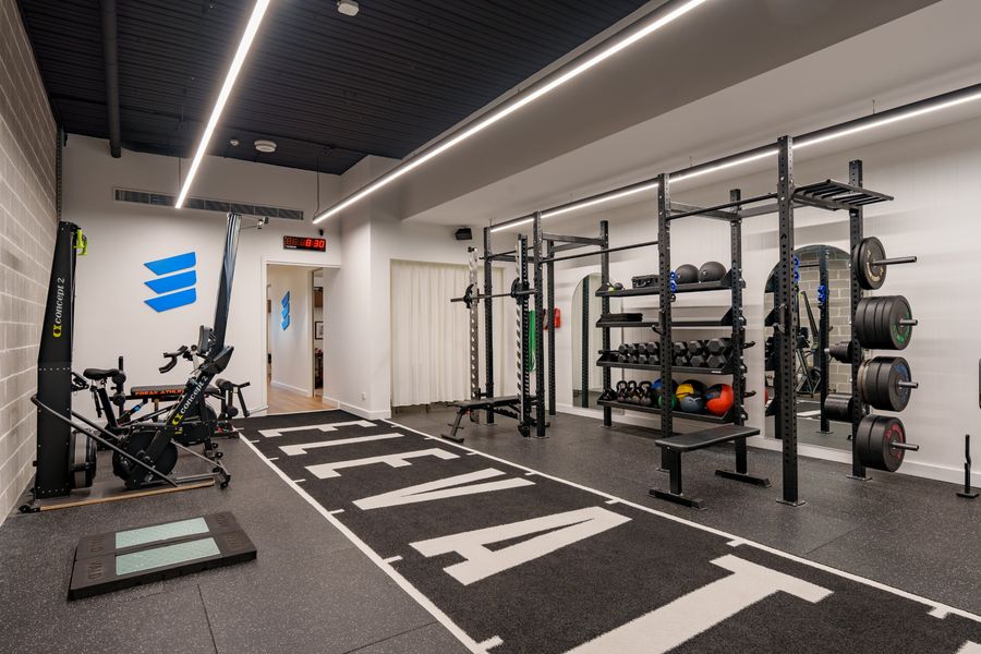 Rehab gym with VALD force plates and strength equipment at Elevate Health Bella Vista
